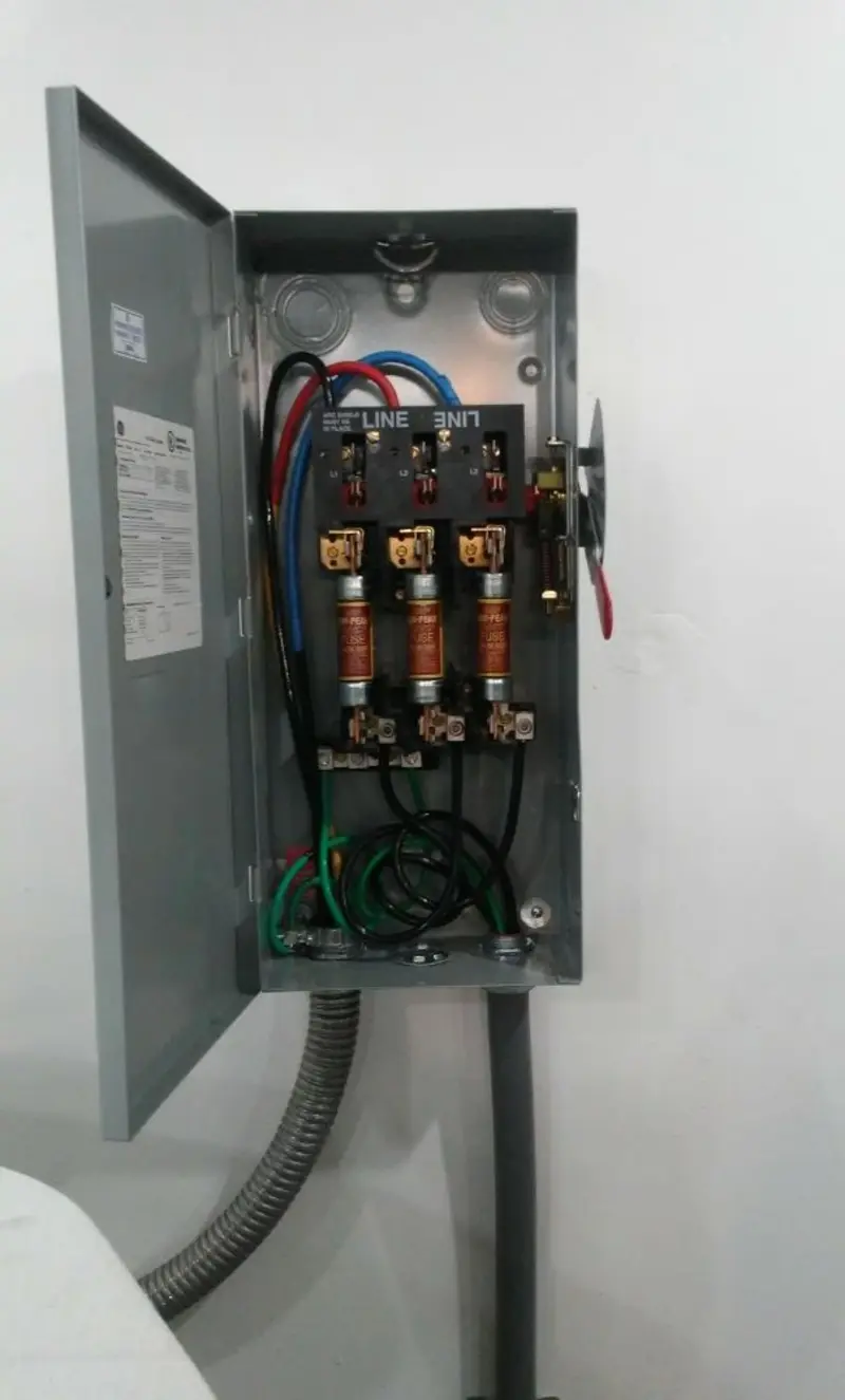 Three-phase disconnect switch installed for Smoke Detector Installation in Harrietstown